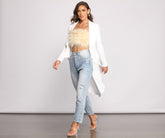 Veste Peplum haute et basse, première de sa catégorie